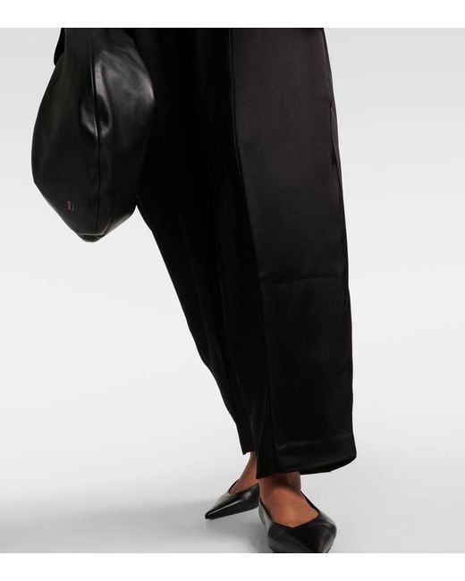 Pantaloni a gamba larga in crepe di raso di Co. in Black