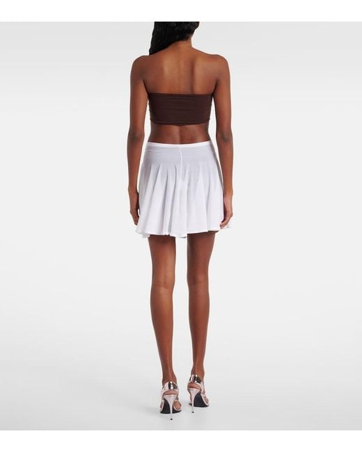 Alaïa White Pleated Semi-Sheer Miniskirt