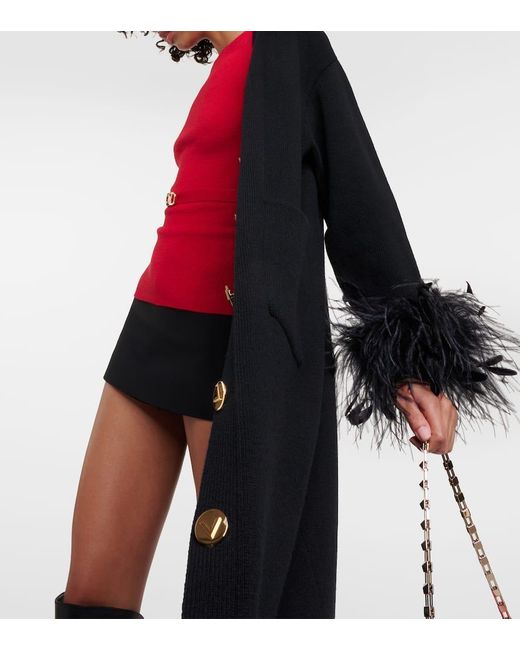 Cardigan de lana virgen con plumas Valentino de color Black