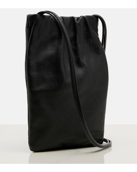 The Row Black Bourse Leather Phone Pouch