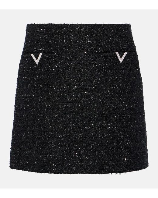Minigonna in tweed di Valentino in Black