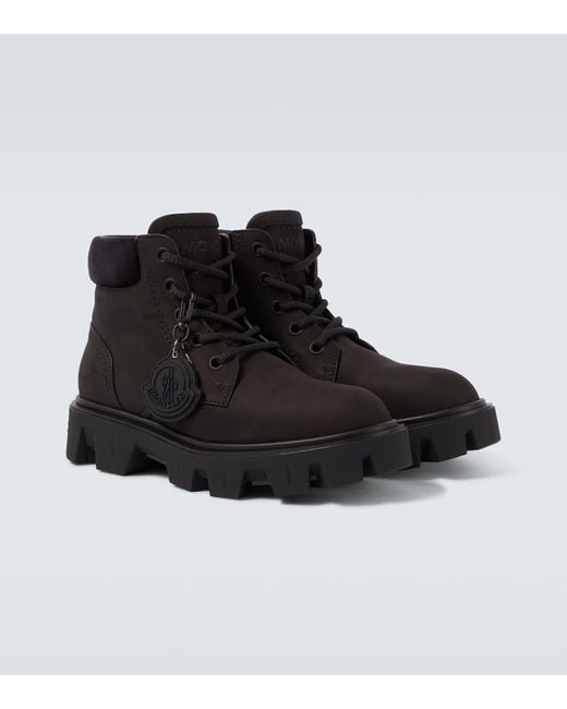 Stivaletti Peak City di Moncler in Black da Uomo