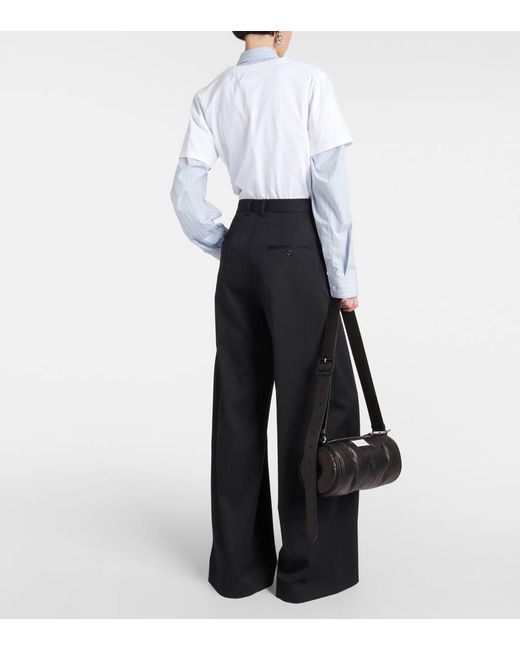 Pantaloni a gamba larga e vita alta di MM6 by Maison Martin Margiela in Black