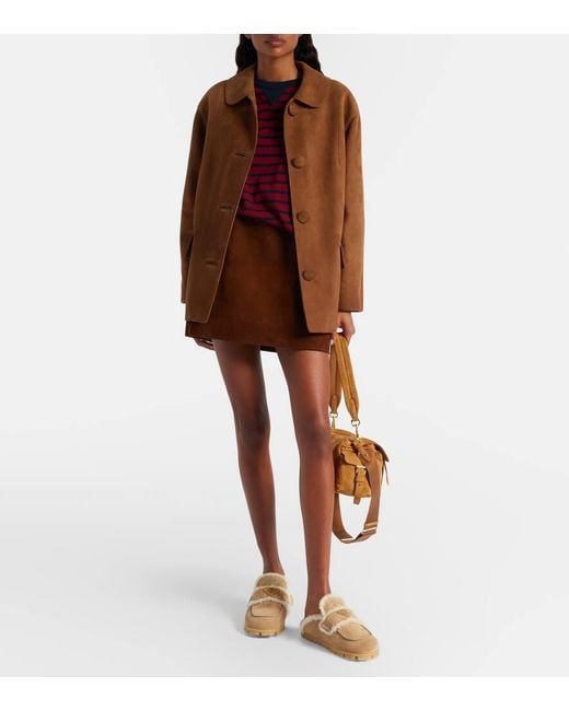 Mules di Prada in Natural