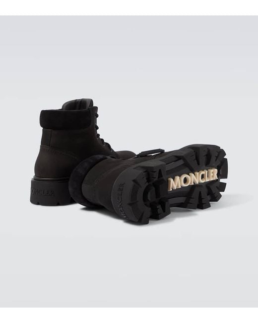 Stivaletti Peak City di Moncler in Black da Uomo