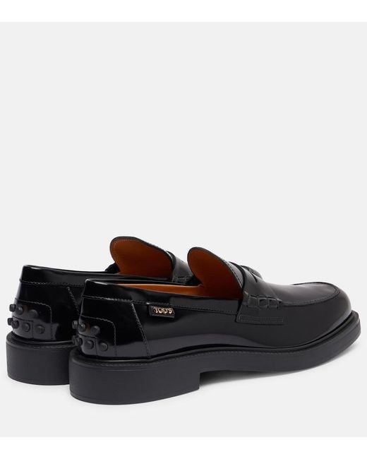 Tod's Black Leather Penny Loafers