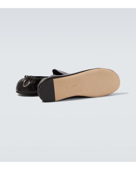 The Row Black Casa Leather Slip-On Shoes for men