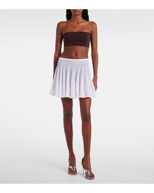 Alaïa White Pleated Semi-Sheer Miniskirt