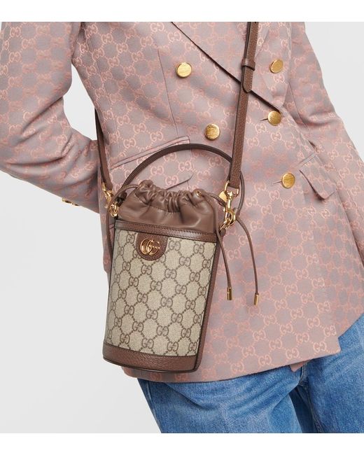 Bolso saco Ophidia Mini de lona GG Gucci de color Brown