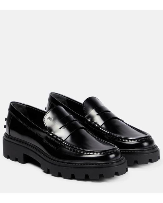 Tod's Black Schwarze Lederflache Slipper Für Damen