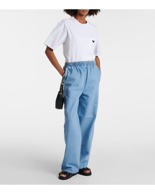 Jeans A Gamba Larga Con Logo di Prada in Blue