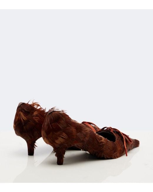 Pumps di Prada in Brown