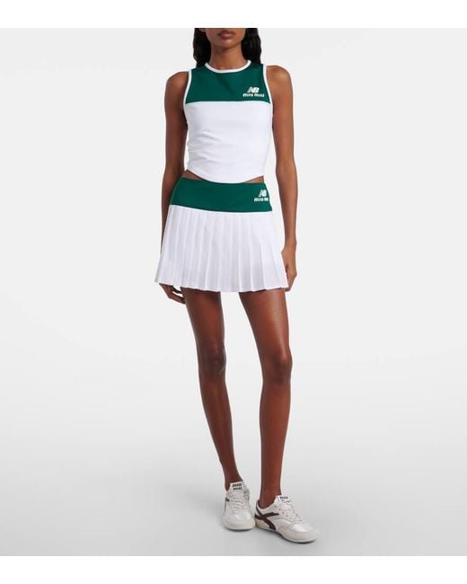X New Balance Minifalda De Jersey Plisada Miu Miu de color Green