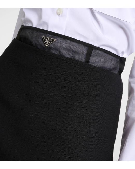 Mini-jupe a taille haute Prada en coloris Black