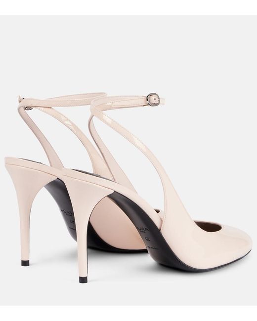 Alaïa White Patent Leather Slingback Pumps