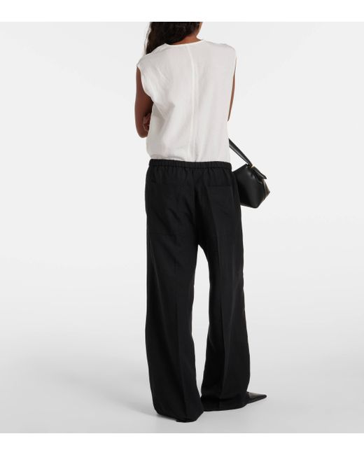Pantalon ample Totême  en coloris Black