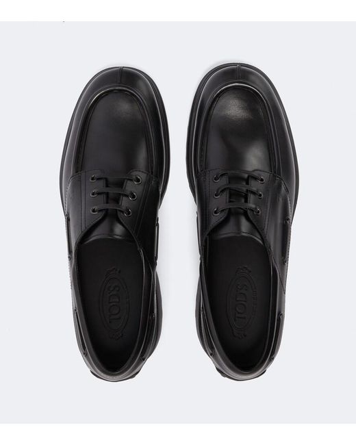 Tod's Black Leather Boat Shoes for men