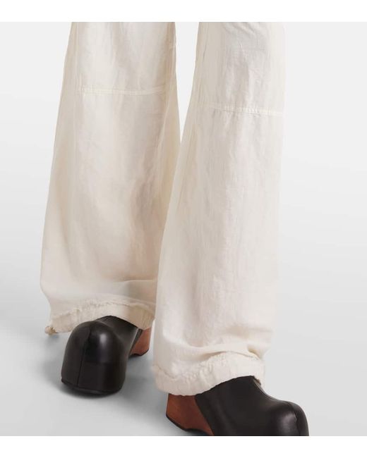 Pantaloni a gamba larga in cotone e lino di Acne in White
