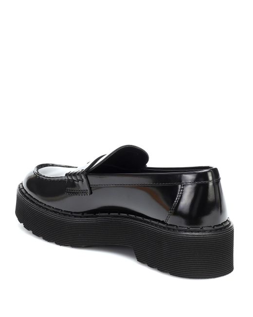 black patent leather platform loafers