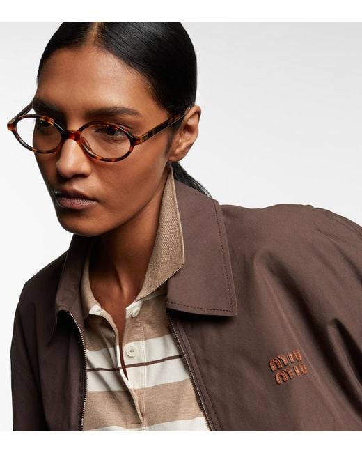 Miu Miu Brown Oval Glasses