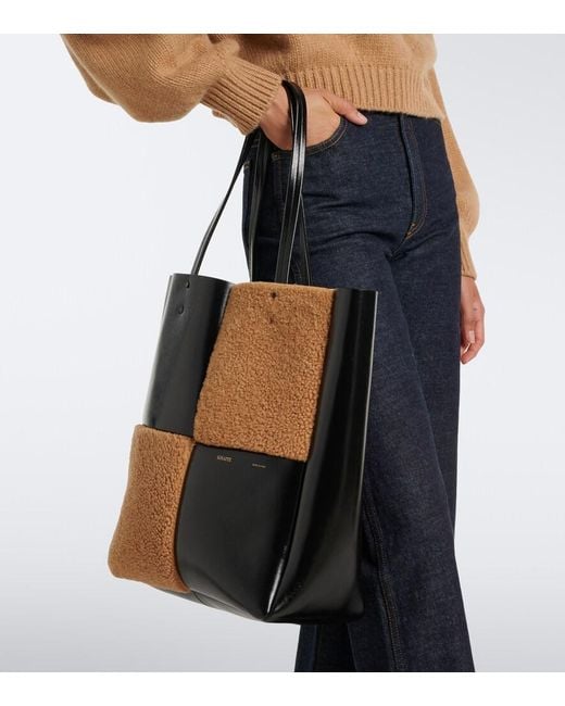 Khaite Black Zoe Medium Shearling Paneled Tote Bag