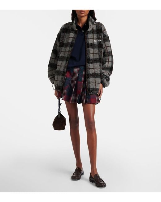 Miu Miu Black Patchwork Plaid Virgin Wool Miniskirt