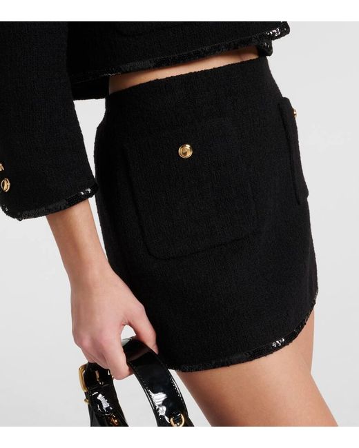 Minifalda de mezcla de lana Miu Miu de color Black