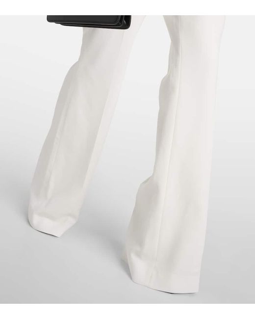 Pantalones flared de crepe con tiro alto Balmain de color White
