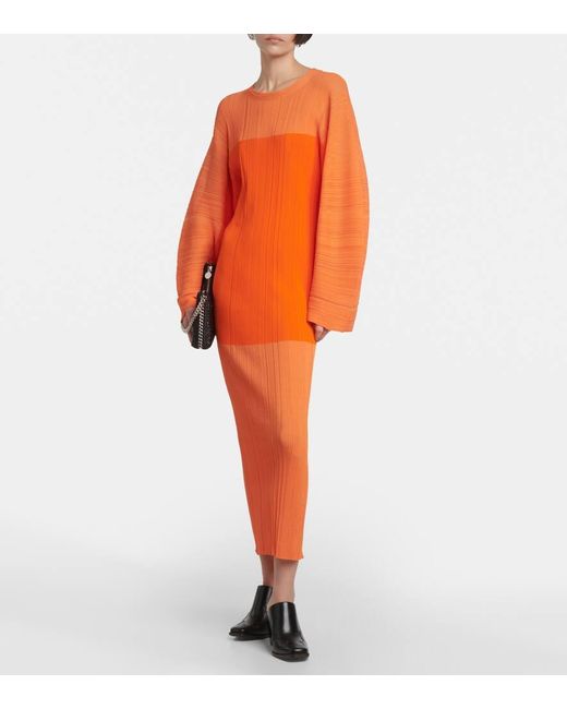 Vestido midi de punto plisado Stella McCartney de color Orange