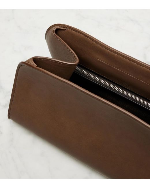 The Row Brown Peggy Small Leather Clutch