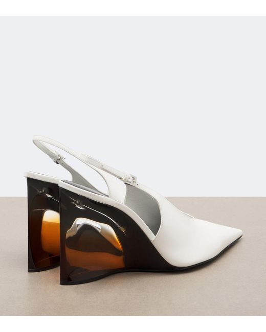 Alaïa White Invisible Leather Wedge Pumps
