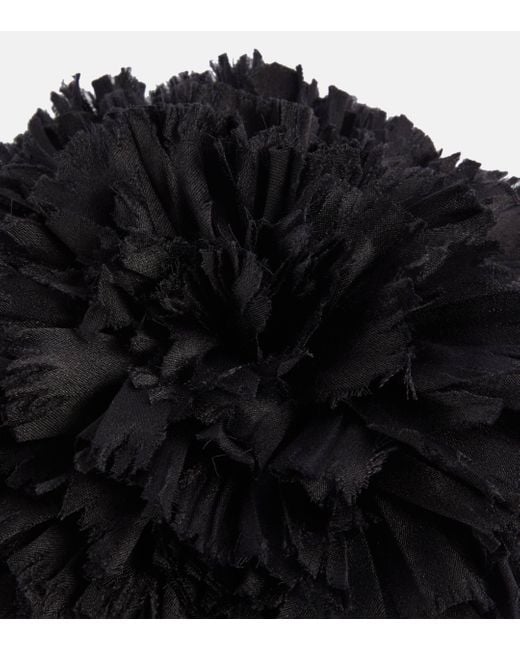 Broche en satin de soie a fleurs Saint Laurent en coloris Black