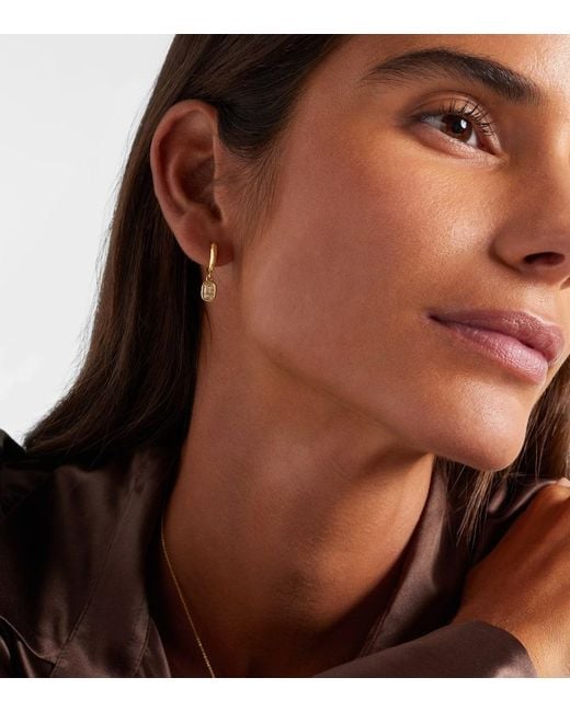 Octavia Elizabeth Hidden Gem 18Kt Huggies With Diamonds in Metallic | Lyst