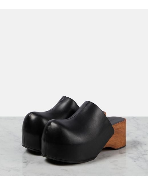 Acne Black Leather Clogs