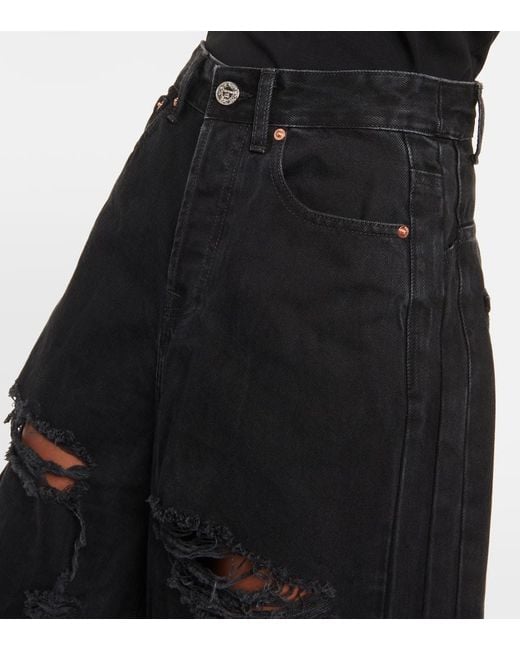 Jeans a gamba larga distressed di Vetements in Black