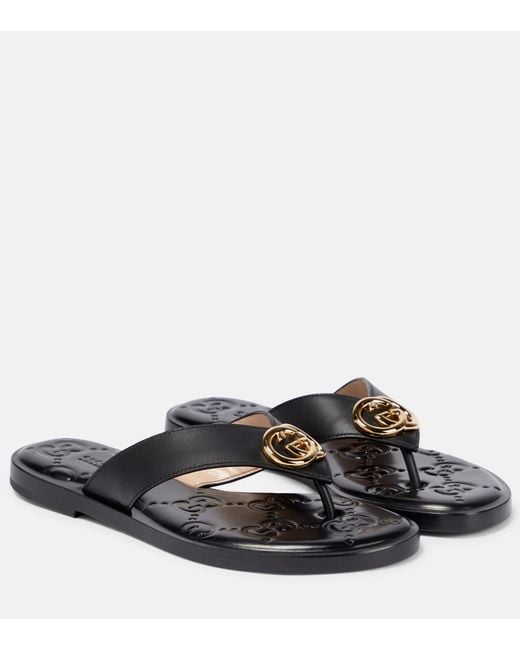 Gucci Interlocking G Leather Thong Sandals in Black | Lyst