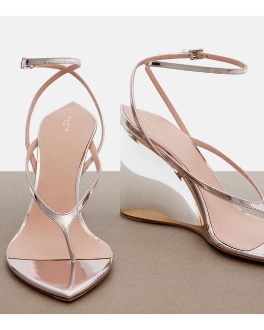 Alaïa White Invisible Leather Wedge Thong Sandals