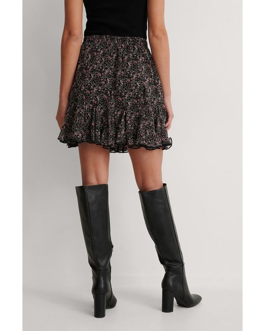 black flowy mini skirt