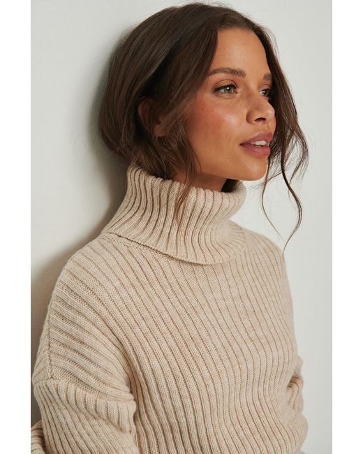 NA-KD Synthetic Beige Ribbed Knitted Turtleneck Side Slit Sweater in Light  Beige (Natural) - Lyst