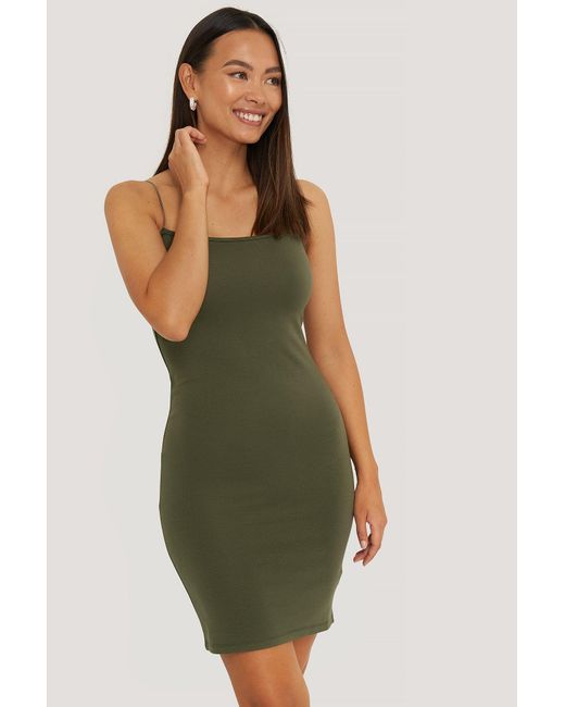 dark green spaghetti strap dress