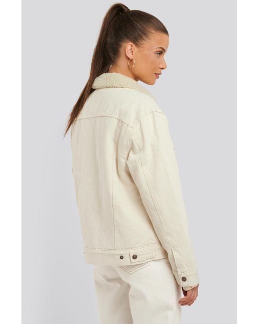 white sherpa trucker jacket