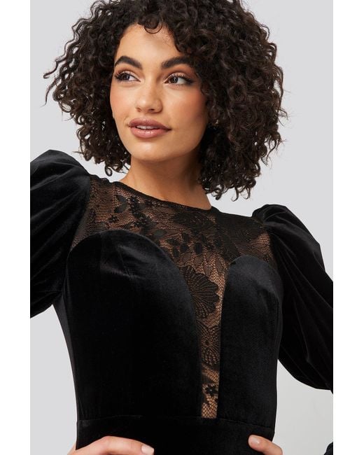 black velvet dress with puff sleeves