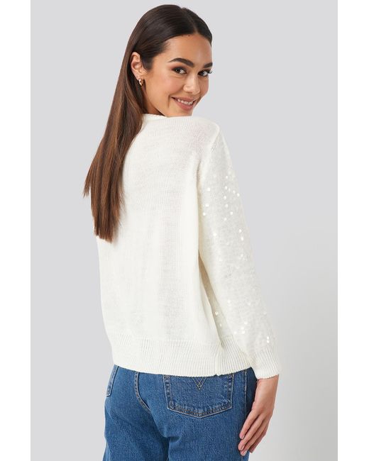 white sequin sweater