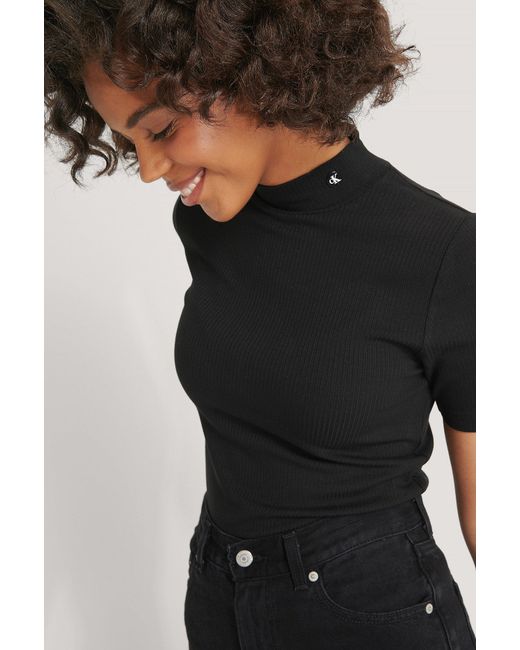 Synthetic Black Rib Ss Mock Neck | Lyst