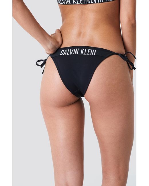 Calvin Klein Cheeky String Side Tie Bikini Panties Black | Lyst