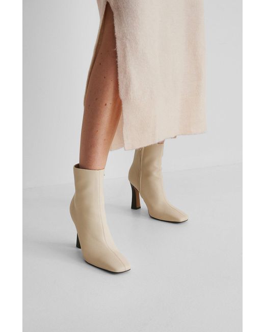 beige high heel booties