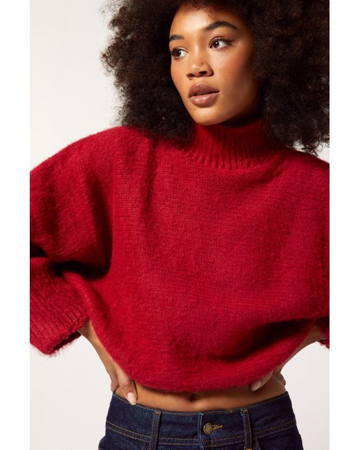 designer red sweater