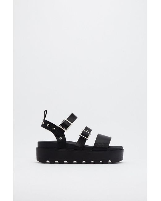 black cleated platform sandals