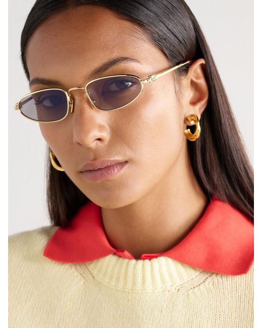 Miu Miu Metallic Goldfarbene Sonnenbrille Mit Ovalem Rahmen