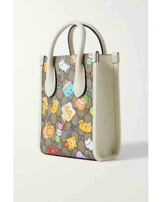 Mini leather-trimmed printed canvas tote